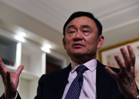 总理选举前一天他信离开泰国 他信曾流亡海外约15年