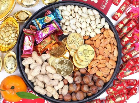 这些过年零食是高盐“重灾区” 中国居民膳食指南推荐每天糖摄入量不超过25克